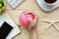 Businesswoman Holding Stress Ball In Hand Royalty Free Stock Photo
