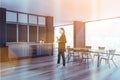 Businesswoman is holding tea cup at bright dining room Royalty Free Stock Photo