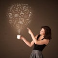 Businesswoman holding a white cup with social media icons Royalty Free Stock Photo