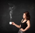 Businesswoman holding a white steamy cup