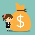 Businesswoman hugging a sack of money Royalty Free Stock Photo