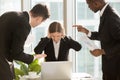 Businesswoman ignoring colleagues critical remarks