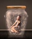 Businesswoman inside a glass jar with lightning drawings concept