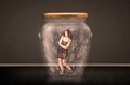 Businesswoman inside a glass jar with lightning drawings concept