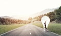 Businesswoman inside light bulb Royalty Free Stock Photo