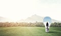 Businesswoman inside light bulb Royalty Free Stock Photo