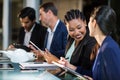 Businesswoman interacting with a colleague Royalty Free Stock Photo