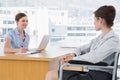 Businesswoman interviewing disabled candidate Royalty Free Stock Photo
