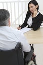 Businesswoman interviewing disabled job Royalty Free Stock Photo