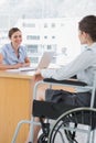Businesswoman interviewing disabled job candidate Royalty Free Stock Photo