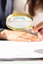 Businesswoman Investigation Finance Using Magnifying Glass