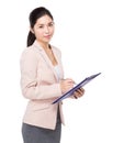 Businesswoman jot note on clipboard Royalty Free Stock Photo