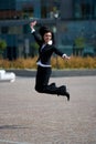 Businesswoman jump outdoors Royalty Free Stock Photo