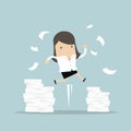 Businesswoman jumping and a mountain of documents.