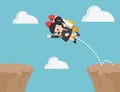 Businesswoman jumps over rocky cliffs.