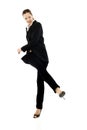Businesswoman kicking Royalty Free Stock Photo