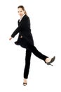Businesswoman kicking Royalty Free Stock Photo
