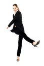 Businesswoman kicking