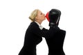 Businesswoman kissing a dummy