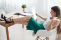 Businesswoman with laptop and diary concept