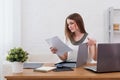 Businesswoman with laptop and diary concept freelance work at home, planning, scheduling