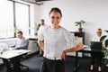 Businesswoman laughing in an office