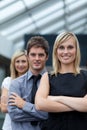 Businesswoman leading her team with folded arms Royalty Free Stock Photo