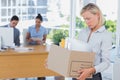 Businesswoman leaving office after being laid off Royalty Free Stock Photo