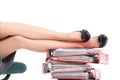 Businesswoman legs pile of binders reast break Royalty Free Stock Photo