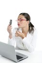 Businesswoman with lipstick and mobile phone Royalty Free Stock Photo