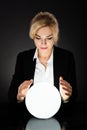 Businesswoman Looking Into The Future At Crystal Ball Royalty Free Stock Photo