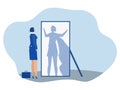 Businesswoman looking at herself in mirror dreaming with super hero with strong motivation Super Hero Shadow Leadership Motivation Royalty Free Stock Photo