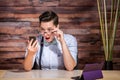 Businesswoman Looking Over Eyeglasses Royalty Free Stock Photo