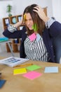 Businesswoman with lots reminder notes