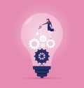 Businesswoman lubricating gears with gear oil in idea bulb - Business concept vector