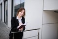 A businesswoman makes a note in a notebook Royalty Free Stock Photo