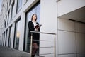 A businesswoman makes a note in a notebook Royalty Free Stock Photo