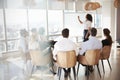 Businesswoman Making Presentation Shot Through Doorway Royalty Free Stock Photo