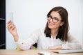 Businesswoman making selfie photo in office