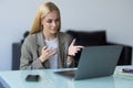 Businesswoman making video call to business partner using laptop. Young woman having discussion with corporate client. Remote job Royalty Free Stock Photo