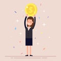 Businesswoman or manager holds a gold coin over his head. The girl in the business suit won the prize. Confetti and