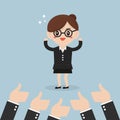 Businesswoman and many hands with thumbs up. Royalty Free Stock Photo