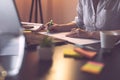 Businesswoman marking segments of a contract with a highlighter Royalty Free Stock Photo