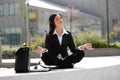 Businesswoman meditating Royalty Free Stock Photo
