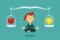 businesswoman meditating with heart and gold coin on balance scale