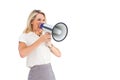 Businesswoman with a megaphone Royalty Free Stock Photo