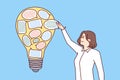Businesswoman near light bulb with stickers in form dialogue bubbles symbolizing new ideas