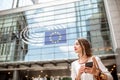 Businesswoman near the parliament building in Brussel Royalty Free Stock Photo