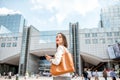 Businesswoman near the parliament building in Brussel Royalty Free Stock Photo