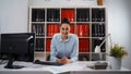 Businesswoman in office smiling portrait